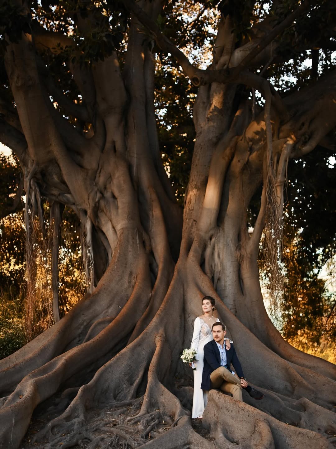 An elegant couple portrait in front of the iconic Valencia Cathedral. Capturing the grand architecture and romantic atmosphere of a destination wedding in Spain.